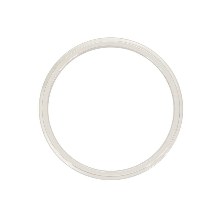 Elegance in simplicity, this Cartier wedding band is from their ‘D’Amour’ collection. The 1.7mm band has been crafted from platinum with a ridge at the top and bottom adding character. The original Cartier hallmarks are seem along the inside of the