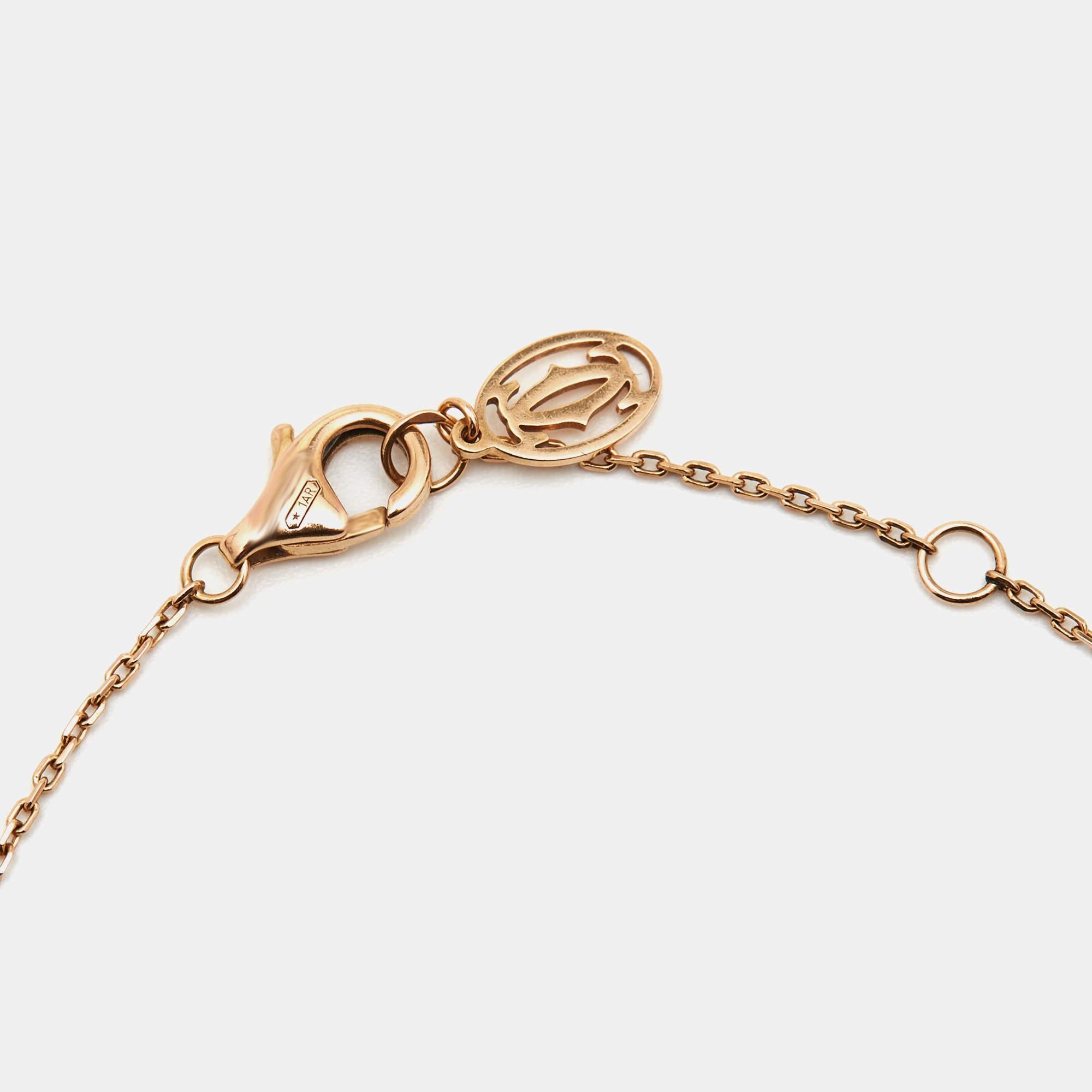 Cartier D' amour collection has pieces designed with wearability in mind to act as everyday symbols of love. From that exclusive line comes this bracelet fashioned in 18k rose gold. The delicate chain is secured by a lobster clasp and highlighted by