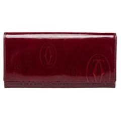 Cartier Portefeuille Continental Happy Birthday en cuir rouge foncé