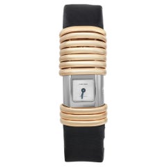 Cartier Declaration Montre pour femmes 16 x 31 mm en or jaune 18 carats, diamants et titane 2611