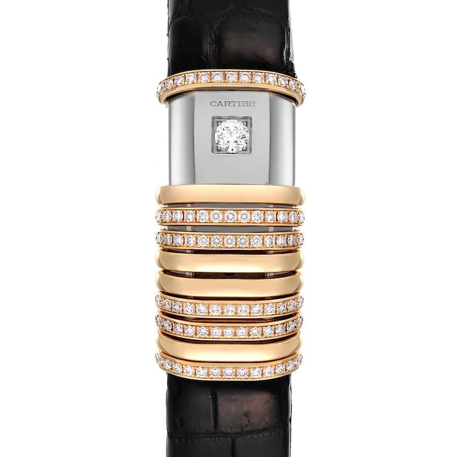 Cartier Declaration Yellow Gold Titanium Diamond Ladies Watch WT000150. Quartz movement. Elongated curved titanium case 39 x 18 mm. Ten 18K yellow gold mobile sliding bands (six diamond set) moving freely along its length to reveal the dial or round