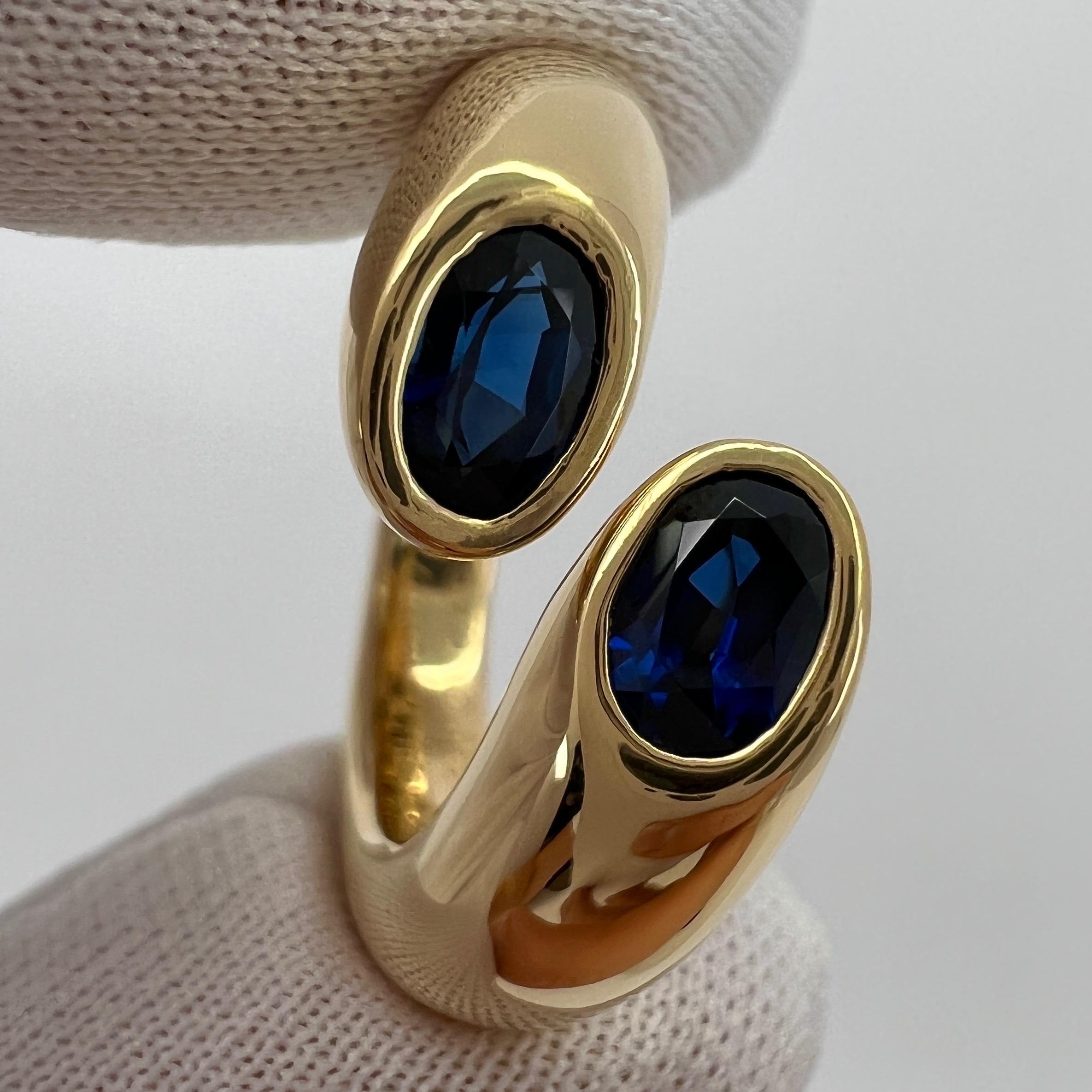 Rare Vintage Cartier Deep Blue Sapphire 18k Yellow Gold Bypass Ring.

Stunning yellow gold ring set with 2 fine deep blue oval cut sapphires. Fine jewellery houses like Cartier only use the finest of gemstones and these sapphires are no exception. 2