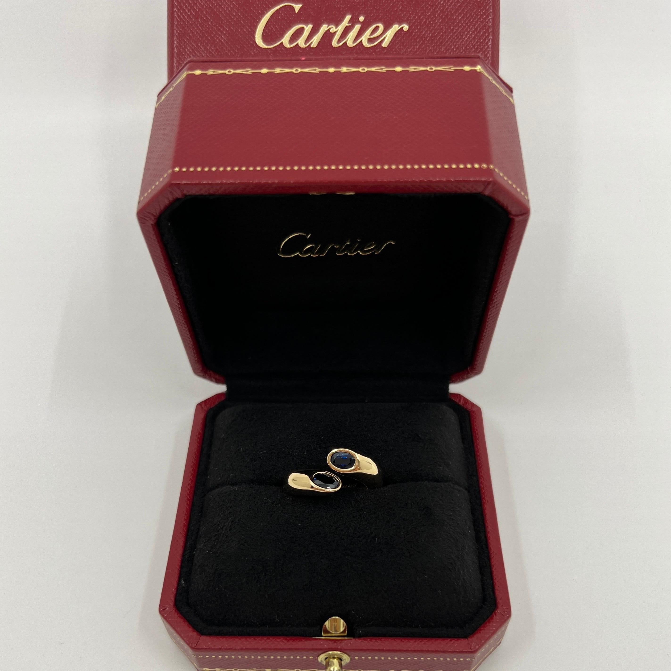 Rare Vintage Cartier Deep Blue Sapphire 18k Yellow Gold Bypass Ring.

Stunning yellow gold ring set with 2 fine deep blue oval cut sapphires. Fine jewellery houses like Cartier only use the finest of gemstones in their jewellery and these sapphires