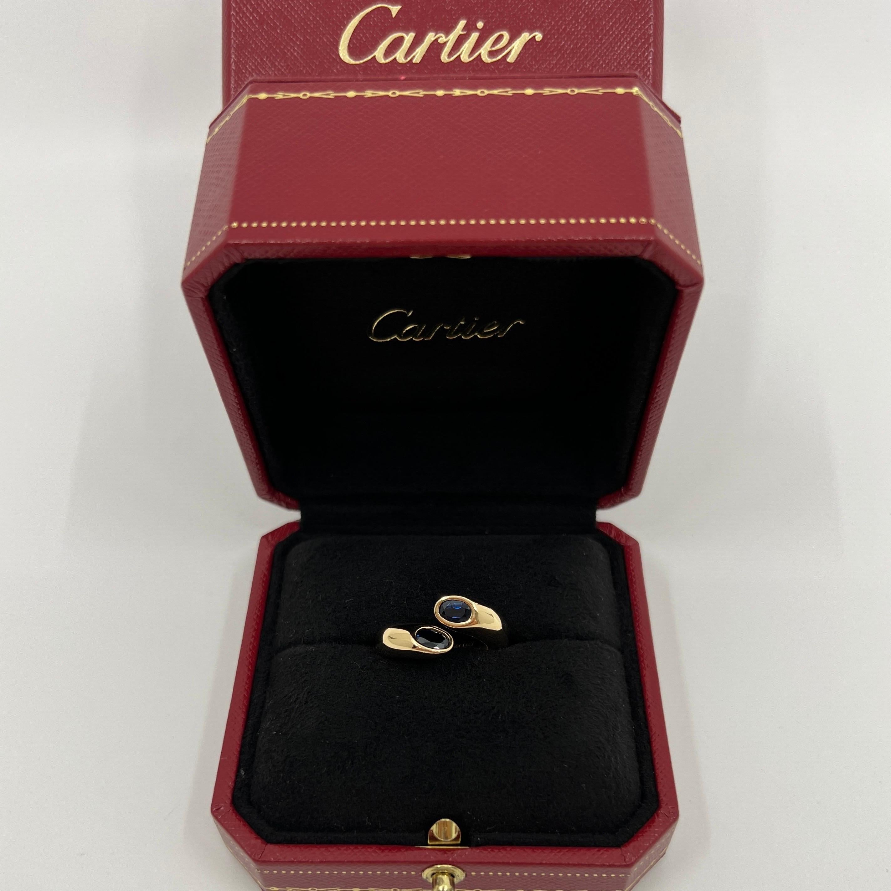 Women's or Men's Cartier Deep Blue Sapphire Oval Cut Ellipse 18k Gold Bypass Split Ring EU53 For Sale