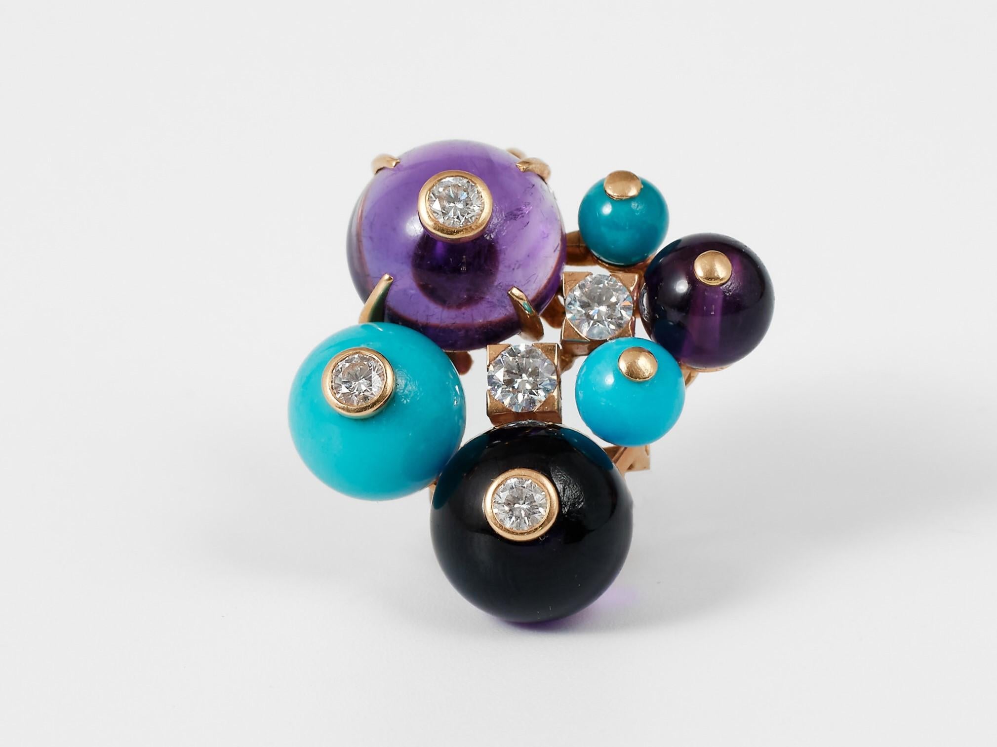 Cartier ‘Délices de Goa' pendant decorated with turquoises and amethysts three of which are enriched with brilliant cut diamonds. 

The Cartier's Les Delices de Goa collection was released in the early 2000s and became an instant classic. The