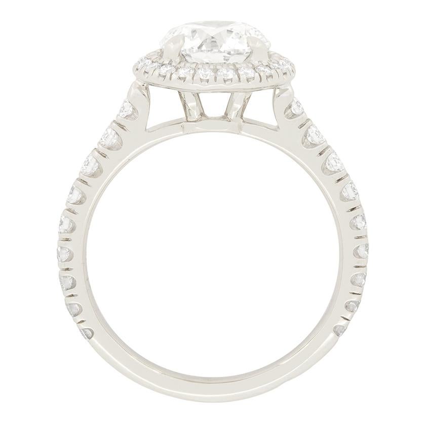 This sublime Cartier Destinée diamond halo ring is the perfect choice to showcase the superb 1.44 carat round brilliant cut diamond set in its centre. The diamond is certified by GIA, and has been graded as F in colour and IF in clarity. There are