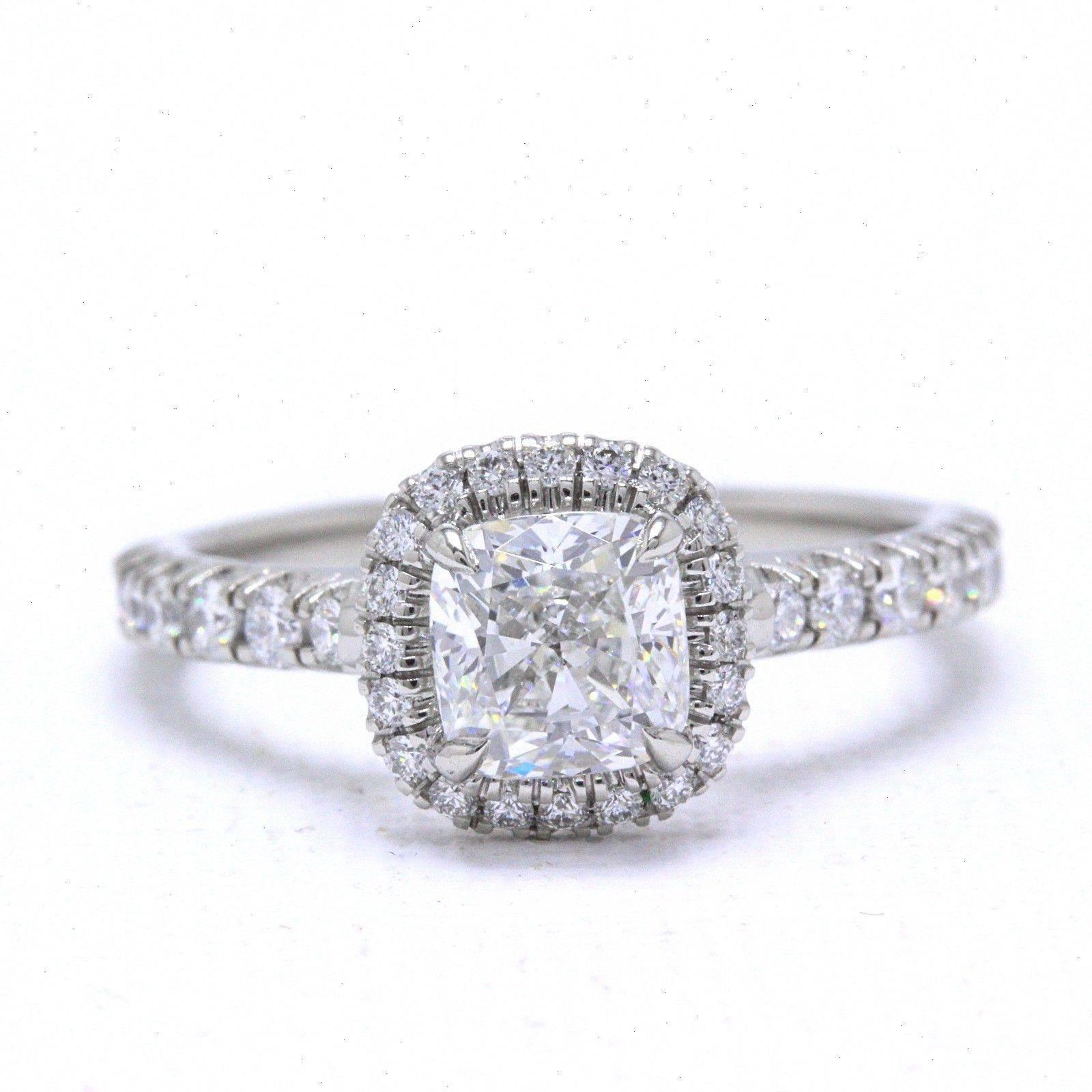 CARTIER DESTINEE DIAMOND ENGAGEMENT RING

Style:  HALO

Serial Number:  DLXXXX CRNXXXXX

Certification:  GIA 6157849481

Metal:  Platinum PT950

Size:  6.25 - SIZABLE

Total Carat Weight:  1.59 TCW

Diamond Shape:  Cushion Modified Brilliant  1.03