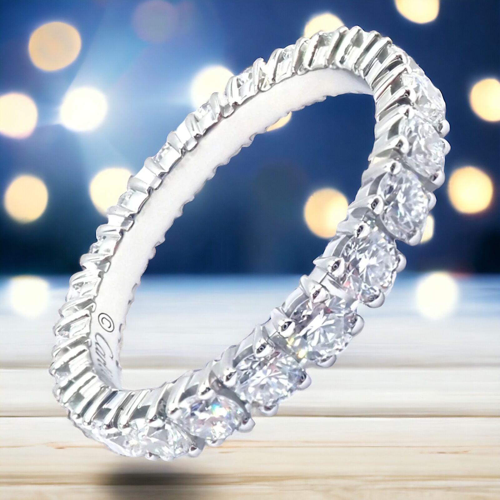 Platinum Diamond Destinee Eternity Wedding Band Ring by Cartier.
The Authentic! Cartier Destinee Platinum Full Diamond Wedding Band, size 6, with certification, is a stunning symbol of love and commitment. 
Crafted from luxurious platinum, this