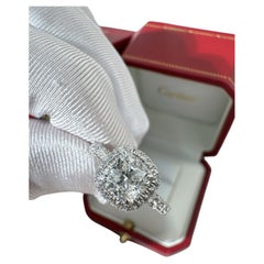Cartier Destinee PT950 Platin-Ring mit einem Diamanten im Kissenschliff (1 Karat) und Halo-Fassung