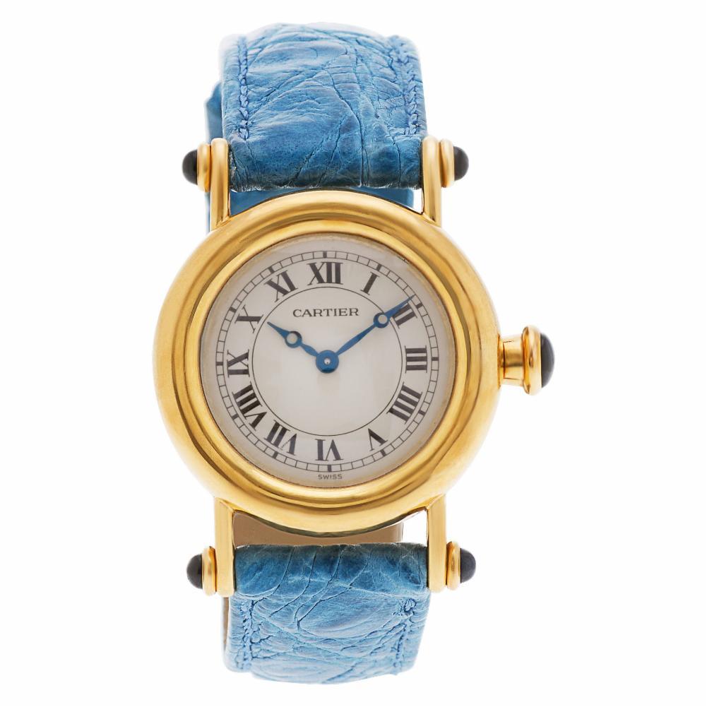 Cartier Diablo Reference #:1440. Ladies Cartier Diablo in 18k on leather strap with 18k yellow gold tang buckle. Quartz. Ref 1440. Fine Pre-owned Cartier Watch. Certified preowned Cartier Diablo 1440 watch is made out of yellow gold on a Blue