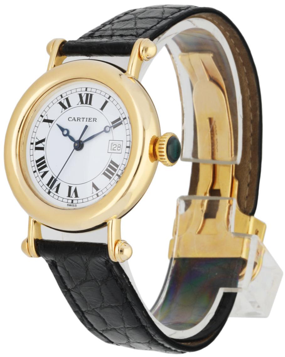 
Cartier Diabolo 1420 Ladies Watch. 33mm 18k yellow case with 18k yellow gold Bezel. White dial with blue steel hands and black Roman numeral hour markers. Date display at the 3 o'clock position. Minute markers on the outer dial. Black leather with