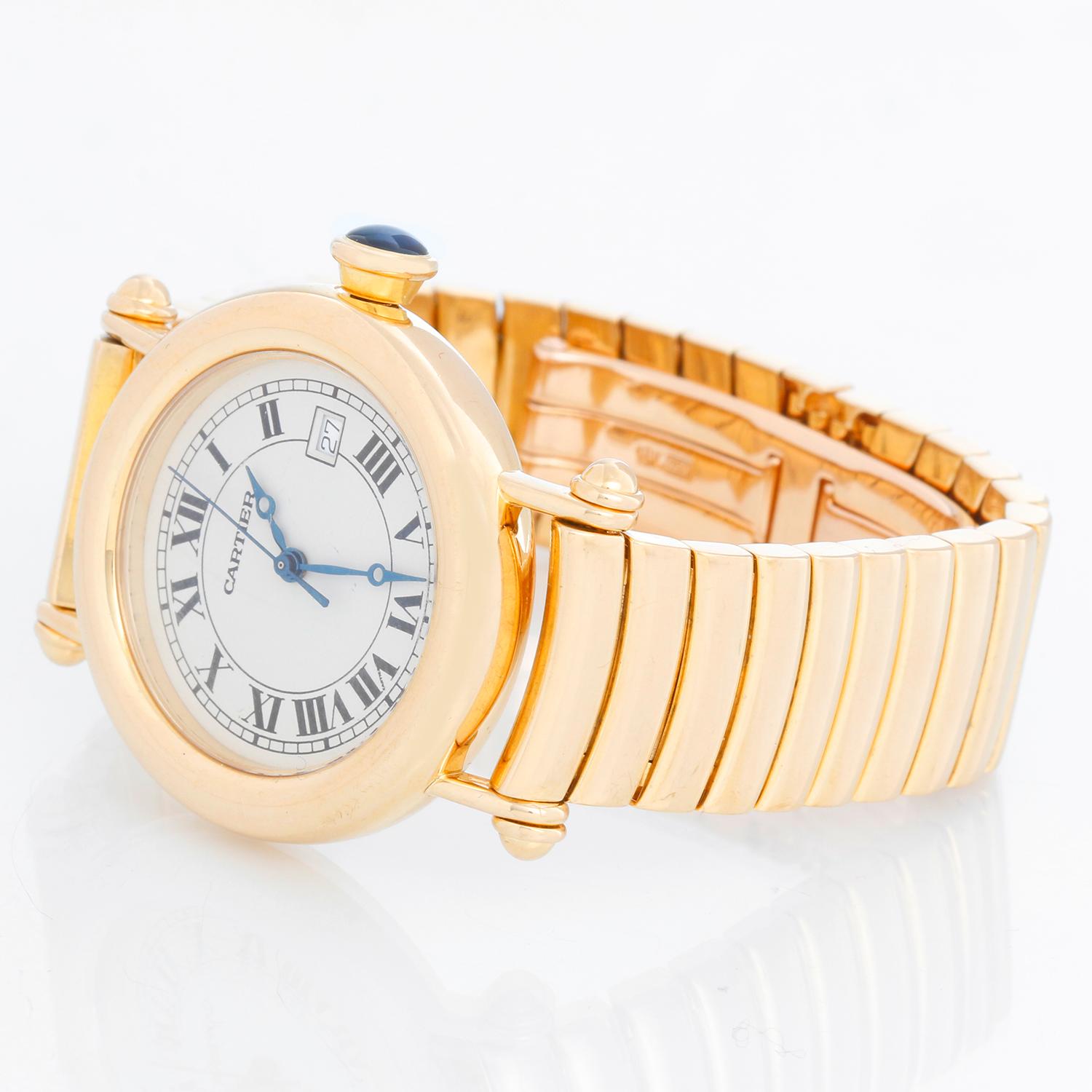 Cartier Diabolo 18k Yellow Gold Midsize Watch 1420 - Quartz, date. 18K Yellow gold ( 36 mm ). Ivory dial with roman numerals. 18k yellow gold Cartier bracelet with deployant clasp; will fit a 6.5 inch wrist. Pre-owned with Cartier box and book.