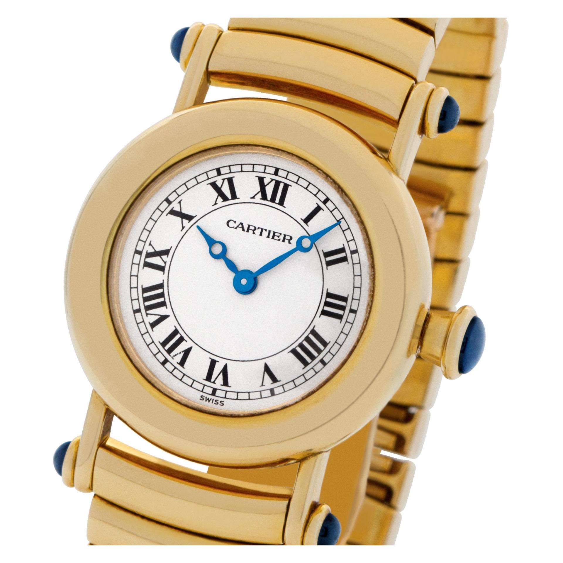  ESTIMATED RETAIL: $19,900   YOUR PRICE: $10,867.00 

Cartier Diabolo in 18k yellow gold with crown and lugs with cabochon sapphires. Quartz movement. 26 mm case diameter size (crown excluded). With box and papers. Ref 1440. Circa 1996. Fine