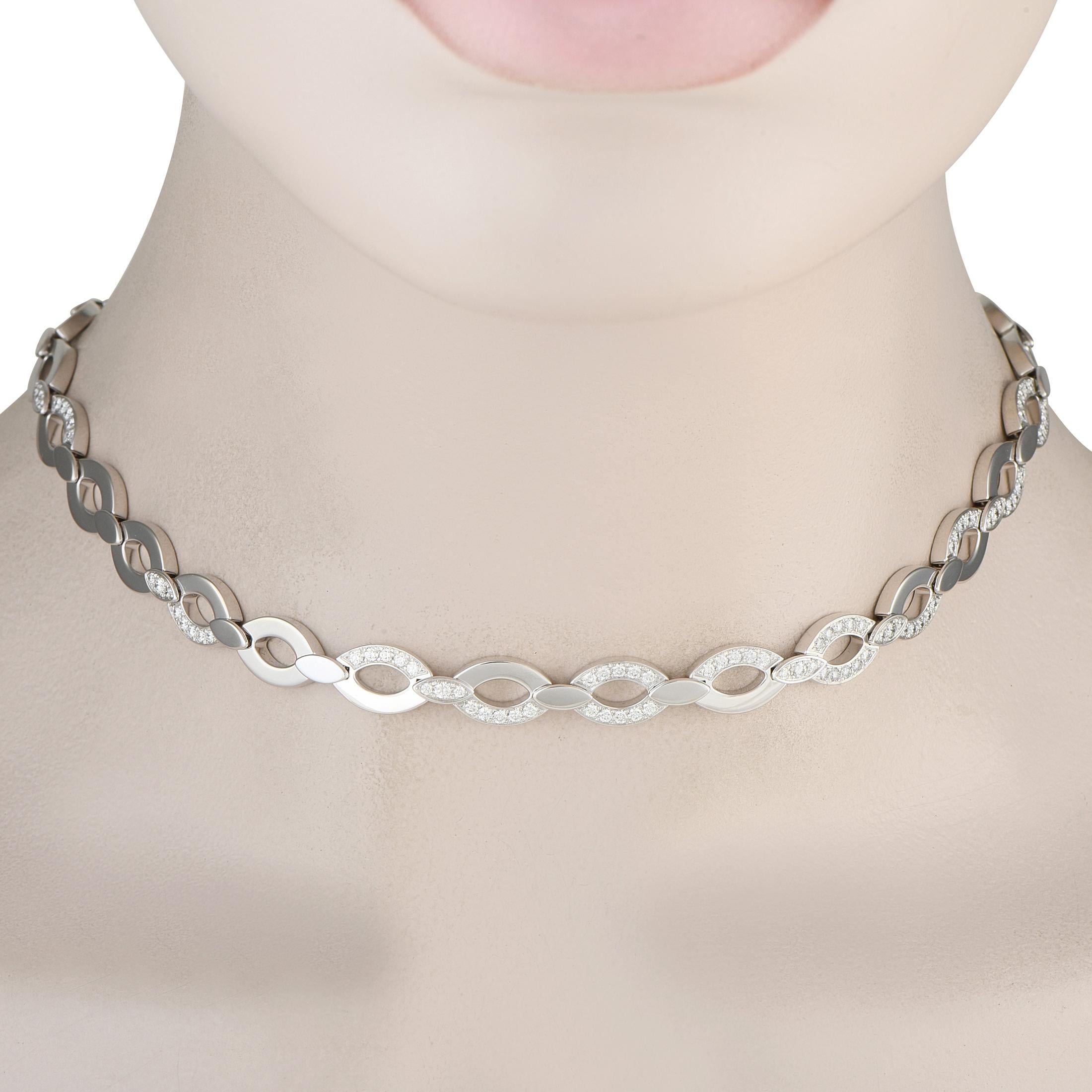 This Cartier Diadea necklace is simple, elegant, and understated. A sleek 18K White Gold setting beautifully showcases inset Diamonds with a total weight of approximately 2.0 carats, which add texture and dimension to the overall design. This piece