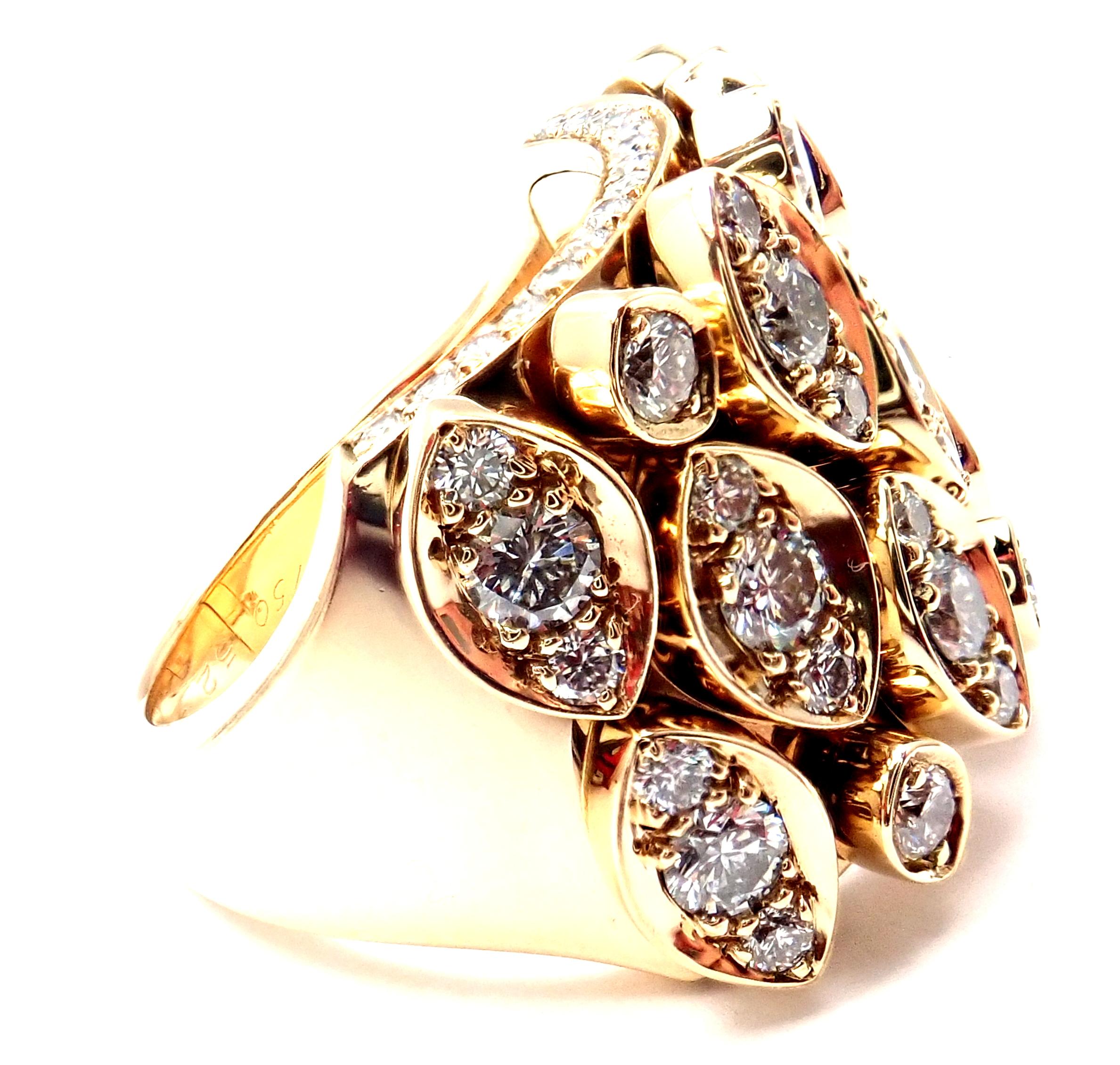 RETIRED and hard to find! 18k Yellow Gold Diadea mobile diamond ring by Cartier.
With 63 round brilliant cut diamonds VVS1 clarity, F-H color total weight approx. 1.70ct
This ring comes with Cartier certificate of authenticity and a Cartier