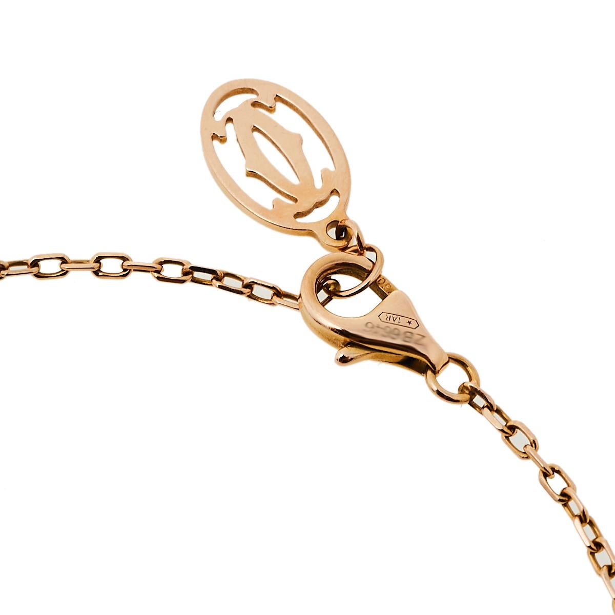 Simple is the new elegant and this bracelet from Cartier is a clear example of the same. Cartier 18k rose gold chain bracelet is centered with a diamond and finished with an adjustable lobster clasp closure. This understated piece is effortlessly