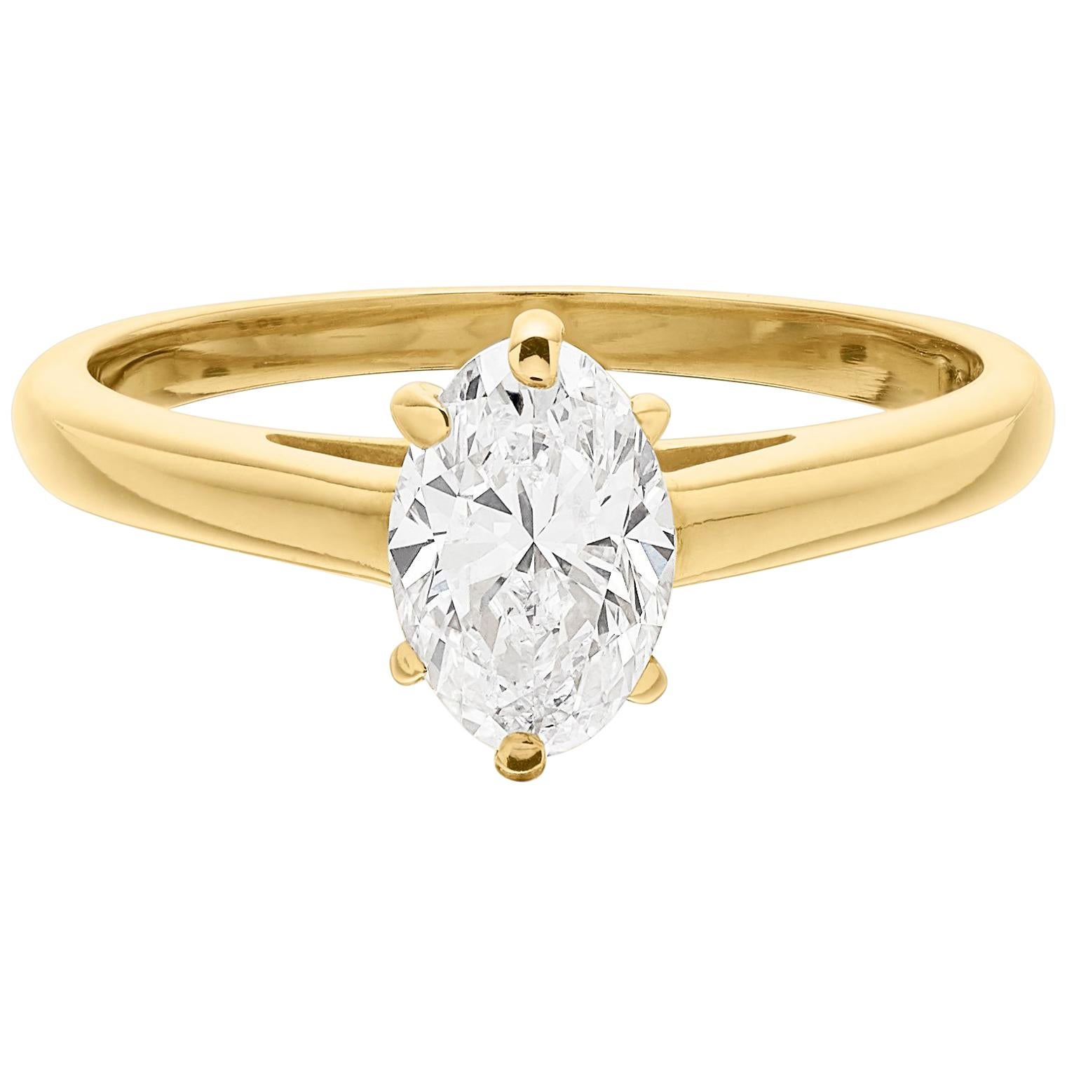 Cartier Diamond, Oval Shape Engagement Ring set in British Hallmarked 18K Gold