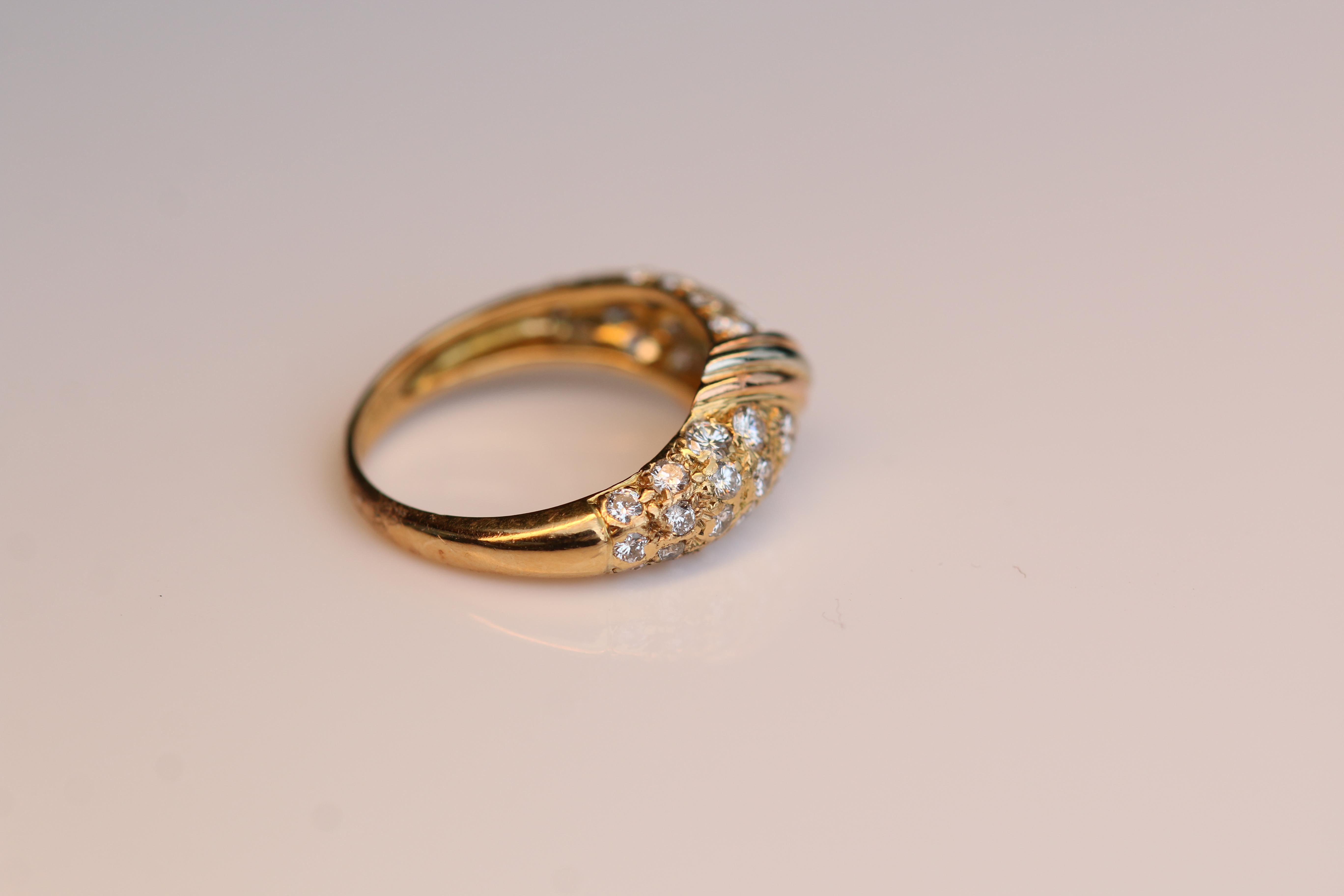 An iconic 18k yellow gold diamond set Cartier ring in 1980. The ring is composed of round brilliant cut diamond  total approximately 80 ct, H colour and VS clarity. The ring is a US size 5 Gross weight of 2.95g

