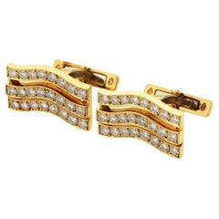 Cartier Manschettenknöpfe aus 18 Karat Gelbgold mit Diamanten