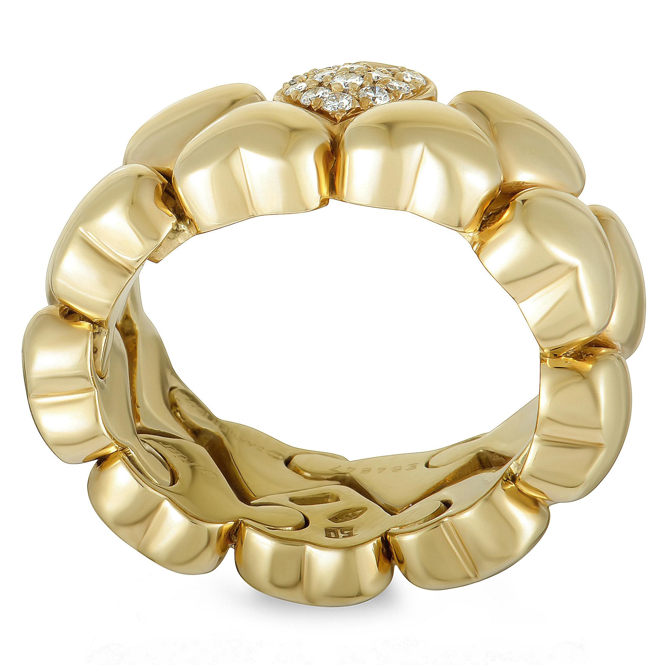 This extraordinarily envisioned piece from Cartier is comprised of a plethora of lovely hearts that give it an incredibly endearing look. The ring is beautifully crafted from 18K yellow gold and luxuriously decorated with scintillating