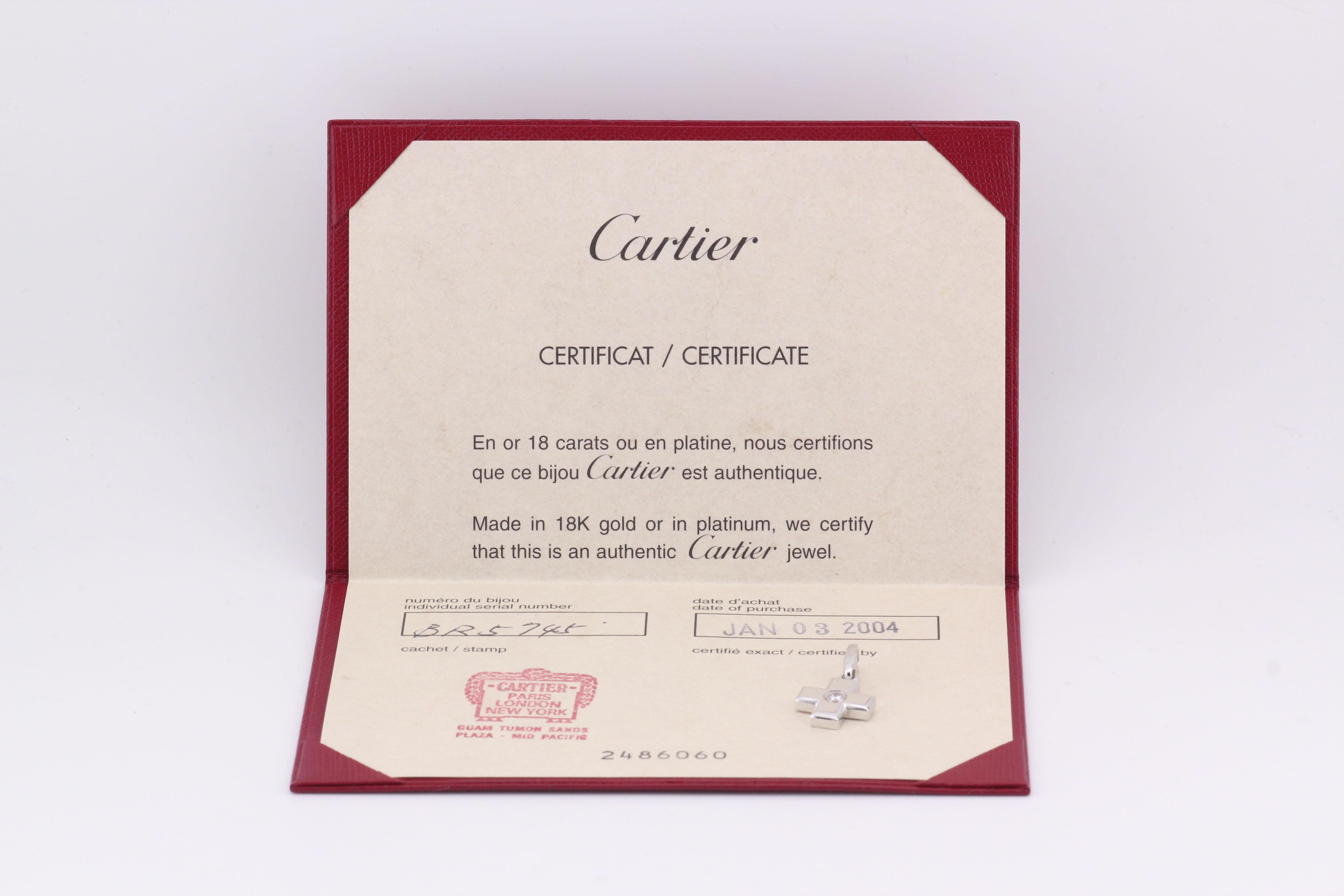 The Cartier Diamond 18K White Gold Cross Charm Pendant is a refined and elegant piece that exemplifies Cartier’s timeless design aesthetic. Crafted in polished 18K white gold, the pendant features a sleek and minimalist cross, symbolizing grace and