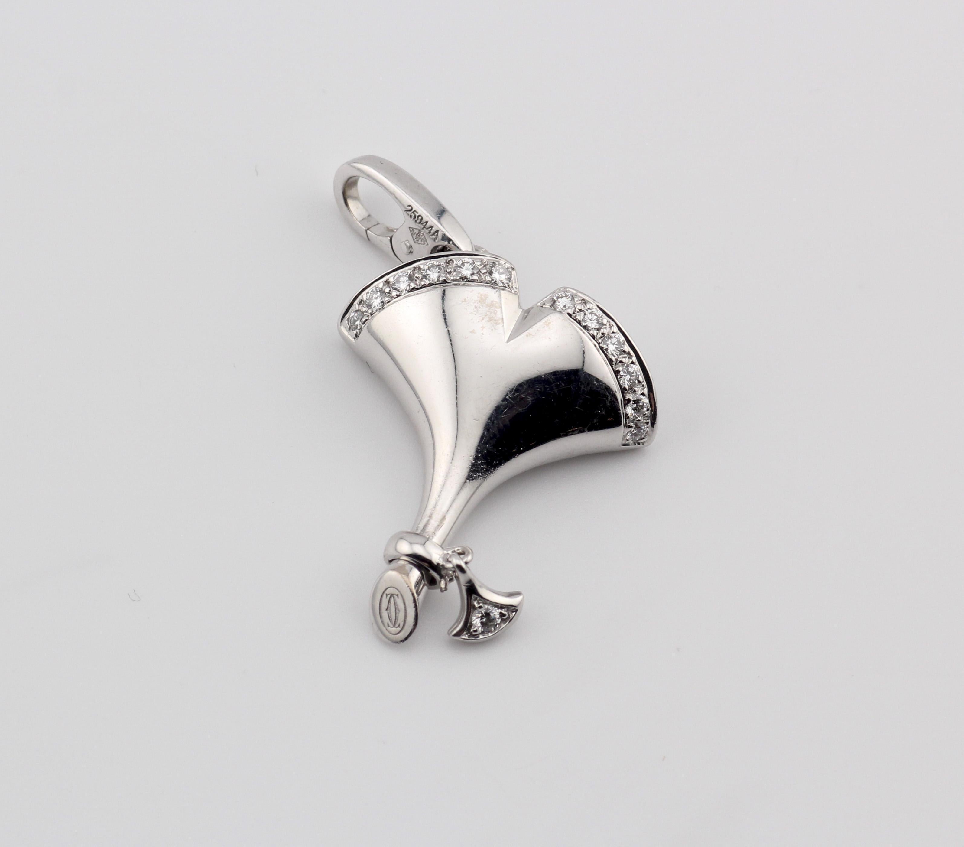 Introducing the Cartier Diamond 18K White Gold Gingko Leaf Charm Pendant, a captivating and timeless piece that exudes elegance and sophistication. Crafted with meticulous attention to detail, this exquisite charm pendant is made from lustrous 18K