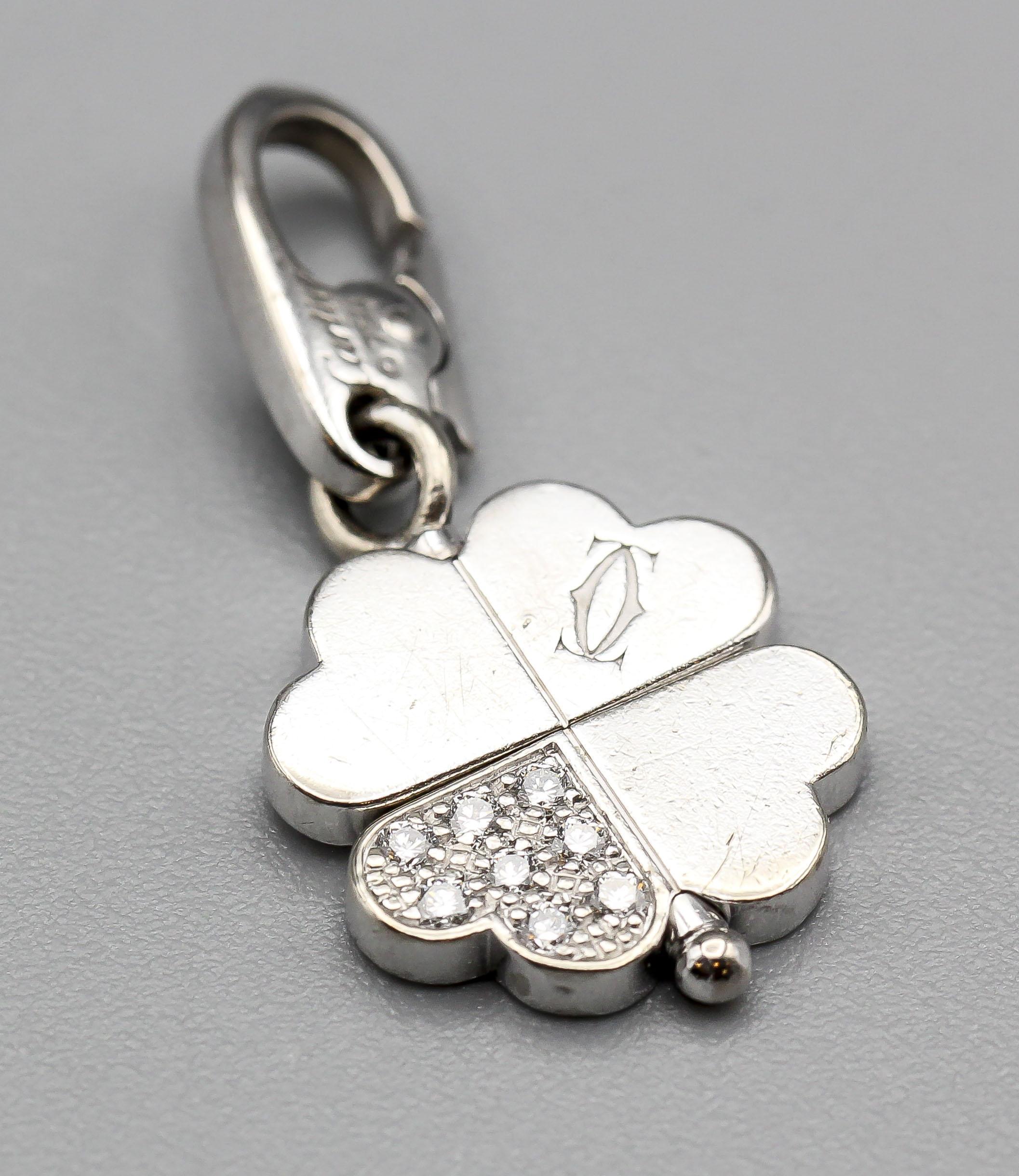Introducing the Cartier Diamond 18k White Gold Rotating Four Leaf Clover Charm Pendant—a captivating and whimsical creation that encapsulates the essence of luck and luxury. This exquisite charm is a testament to Cartier's legacy of elegance,