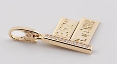 Pendentif à breloque 52nd Street en or jaune 18k avec diamants de Cartier