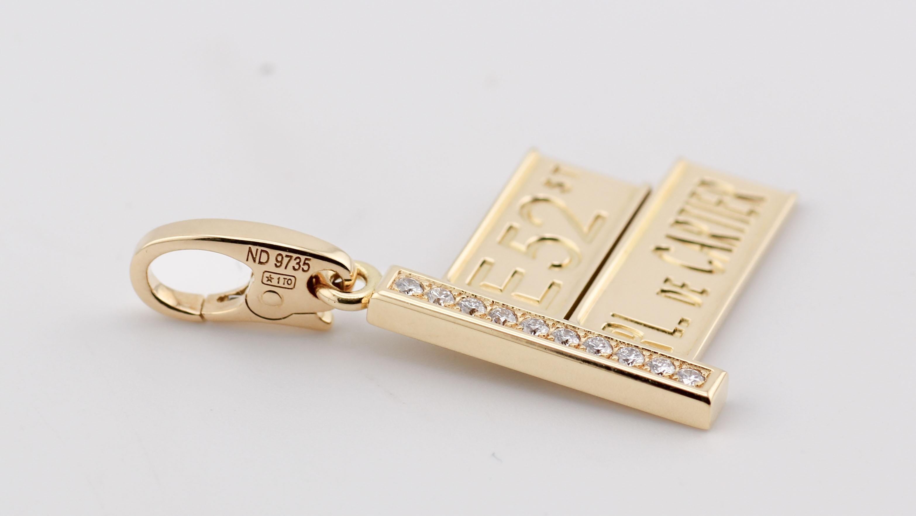 Women's or Men's Cartier Diamond 18k Yellow Gold 52nd Street Sign Charm Pendant For Sale