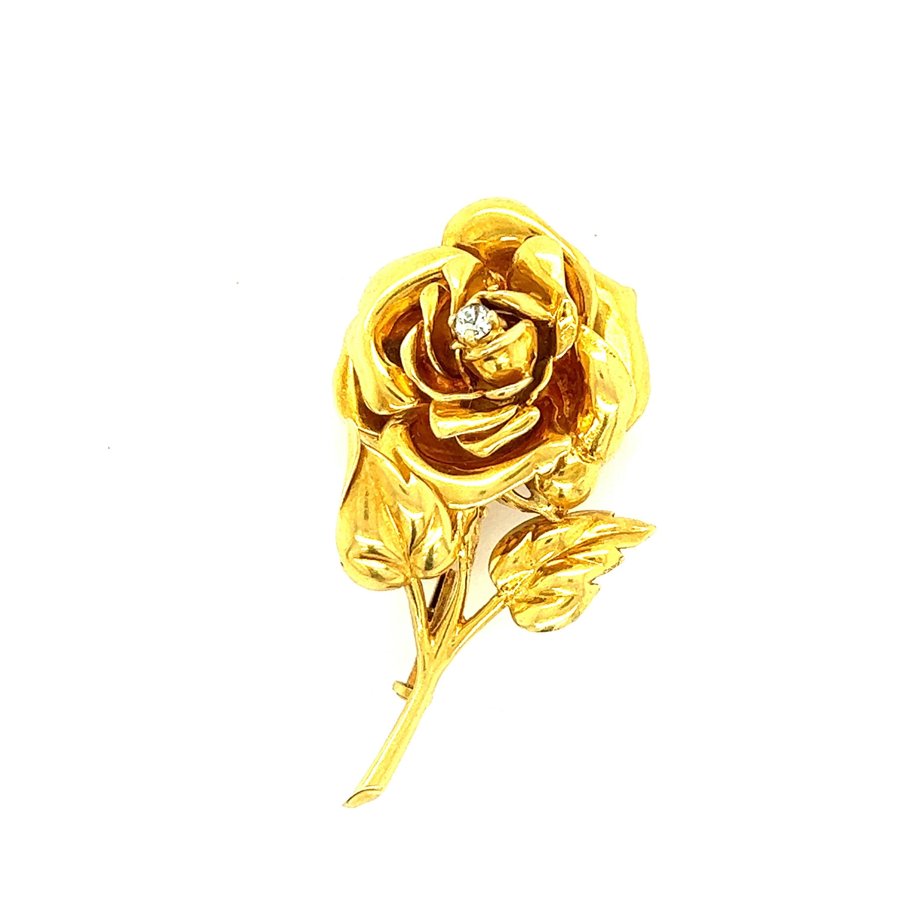 Cartier Diamond 18k Yellow Gold Rose Brooch

One small round-cut diamond of approximately 0.10 carat, beautiful rose motif, made of 18 karat yellow gold; marked Cartier, 750, Swiss made, 2327 (light)

Size: length 4.5 cm, width 2.4 cm
Total weight: