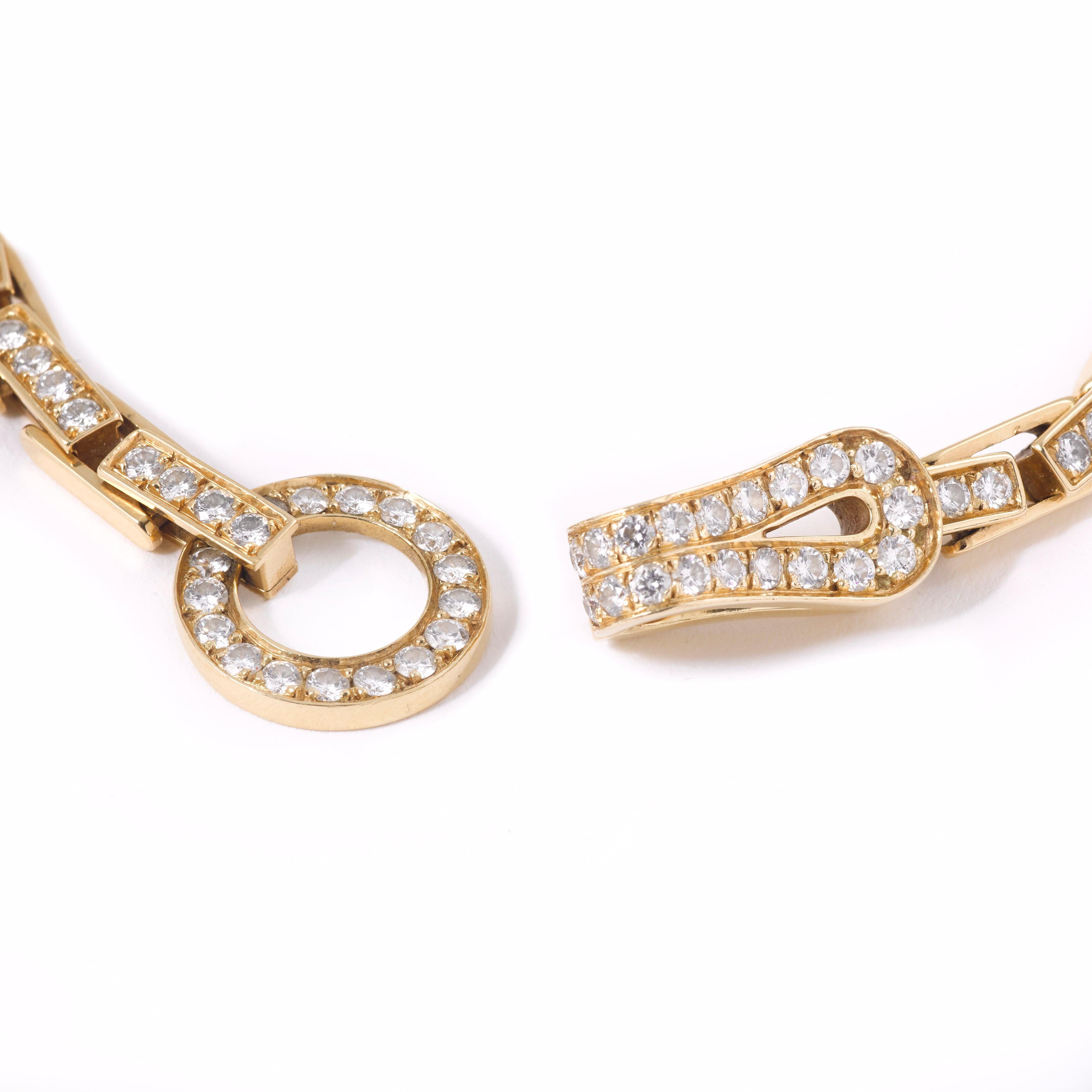 Amazing iconic Cartier Agrafe diamonds 18k Yellow Gold Bracelet.

The Agrafe collection (The word Agrafe in French meaning clip / hook referring to the hook-shape clasp of the necklace) is not longer available at Cartier but this bracelet would be