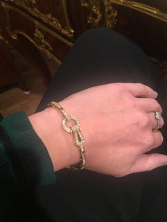 Cartier Diamond Agrafe 18 Karat Yellow Gold Link Bracelet at 1stDibs |  cartier agrafe bracelet