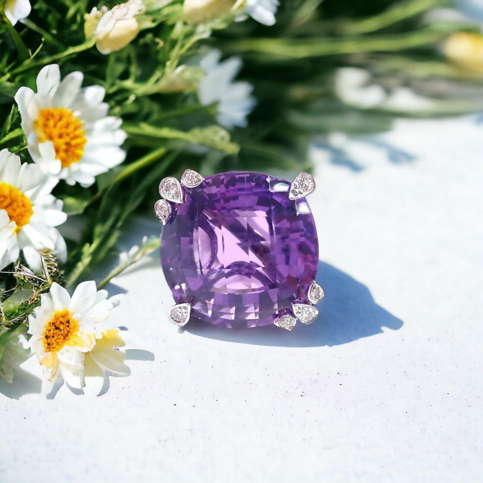18k White Gold Diamond & Amethyst Inde Mysterieuse Large Ring by Cartier. 
A collection from Cartier's 1001 nights. 
The Cartier Inde Mysterieuse 18k White Gold Diamond Amethyst Large Ring features a stunning large amethyst, exquisitely cut and set