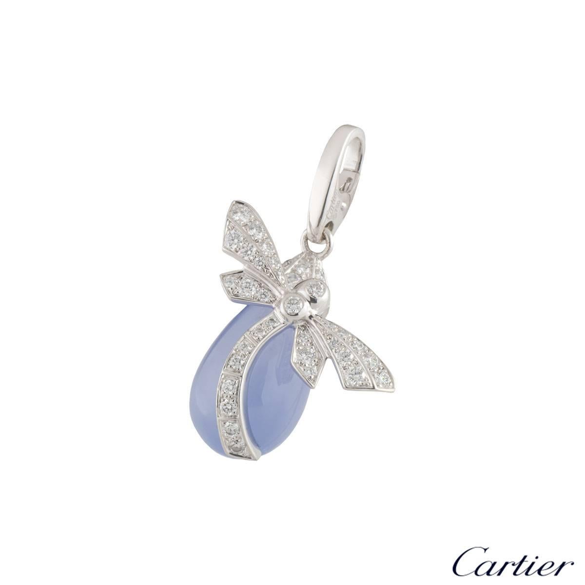 A stunning 18k white gold Cartier dragonfly charm from the Jewelled Insects collection, part of Cartier's menagerie. The charm comprises of  a dragonfly motif encrusted in round brilliant cut diamonds, with a total weight of approximately 0.38ct, F