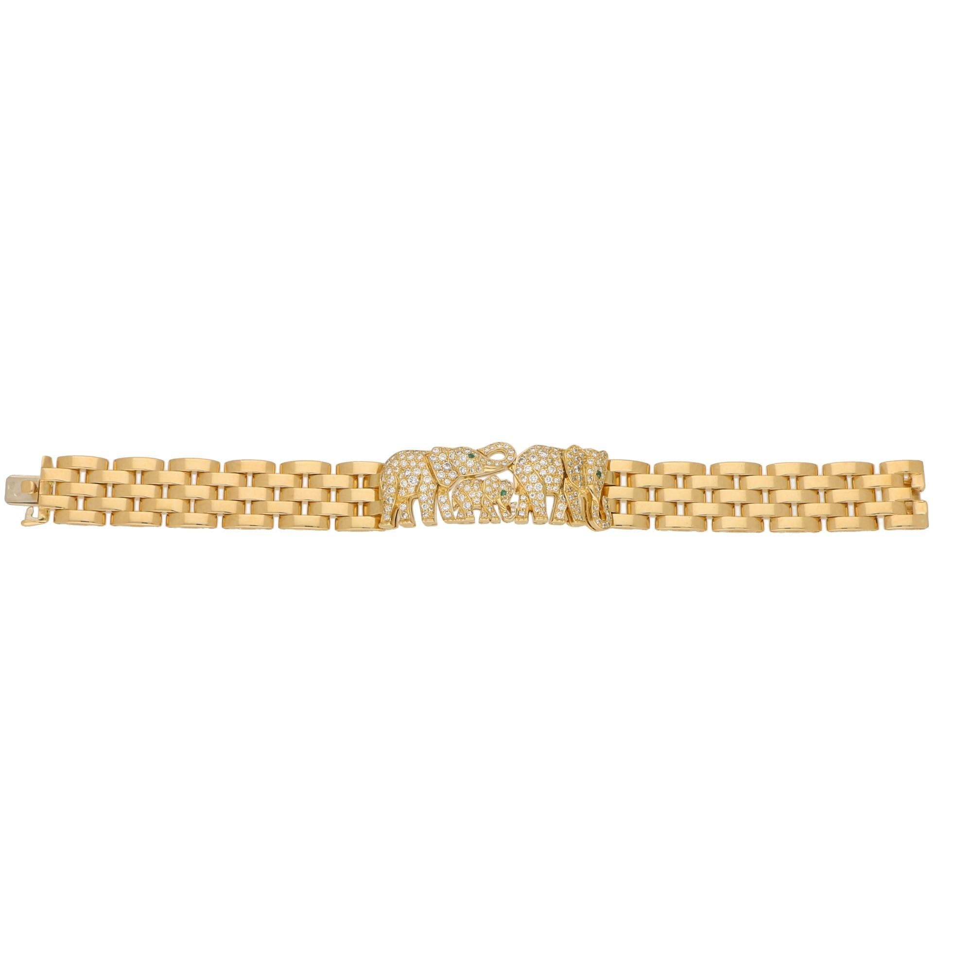 A simply stunning Cartier Paris Elephant Maillon Panthère bracelet set in solid 18k yellow gold; circa early 1980's.

The bracelet is composed of a central panel which depicts a family of three walking elephants. Each elephant is milgrain set with