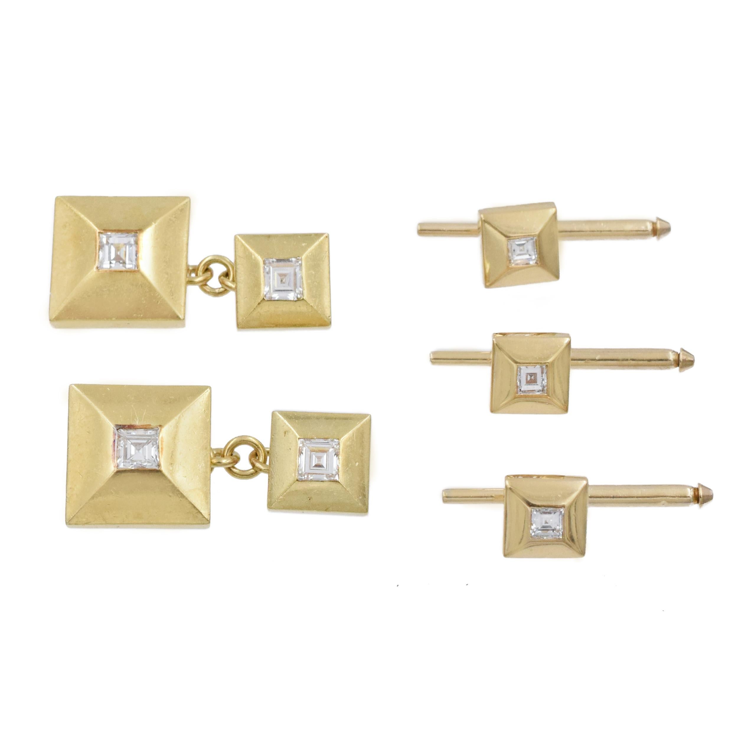 Cartier Diamond And Gold Tuxedo Suite. This Suite Has 2
Cufflinks And 3 Buttons, Each Has A Diamond Center. The 7 Square Cut Diamonds Have A
Total Carat Weight Of Approximately 2.5ct. Signed Cartier And Stamped 18k. Cartier Number 31991 On The