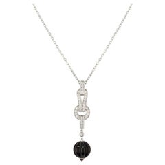 Cartier Diamond and Onyx Agrafe Drop Necklace