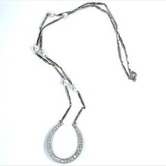 Cartier Diamond and Platinum Horseshoe Pendant Necklace