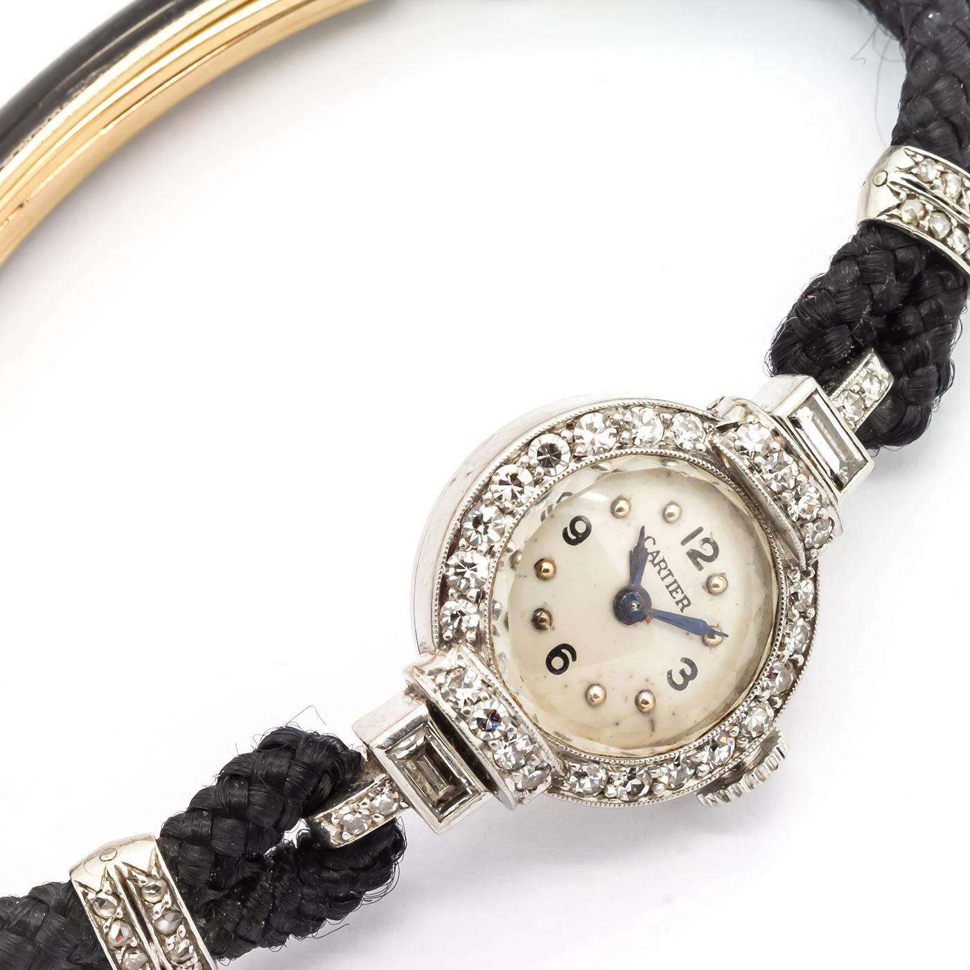 Cartier Diamant- und Platin-Armbanduhr (Baguetteschliff) im Angebot