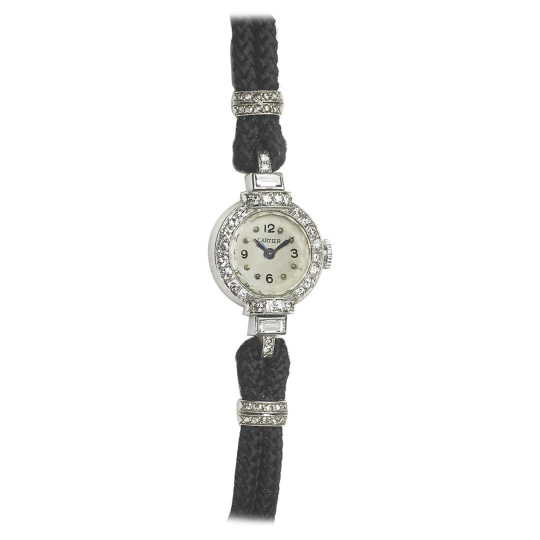 Cartier Diamond And Platinum Wristwatch For Sale