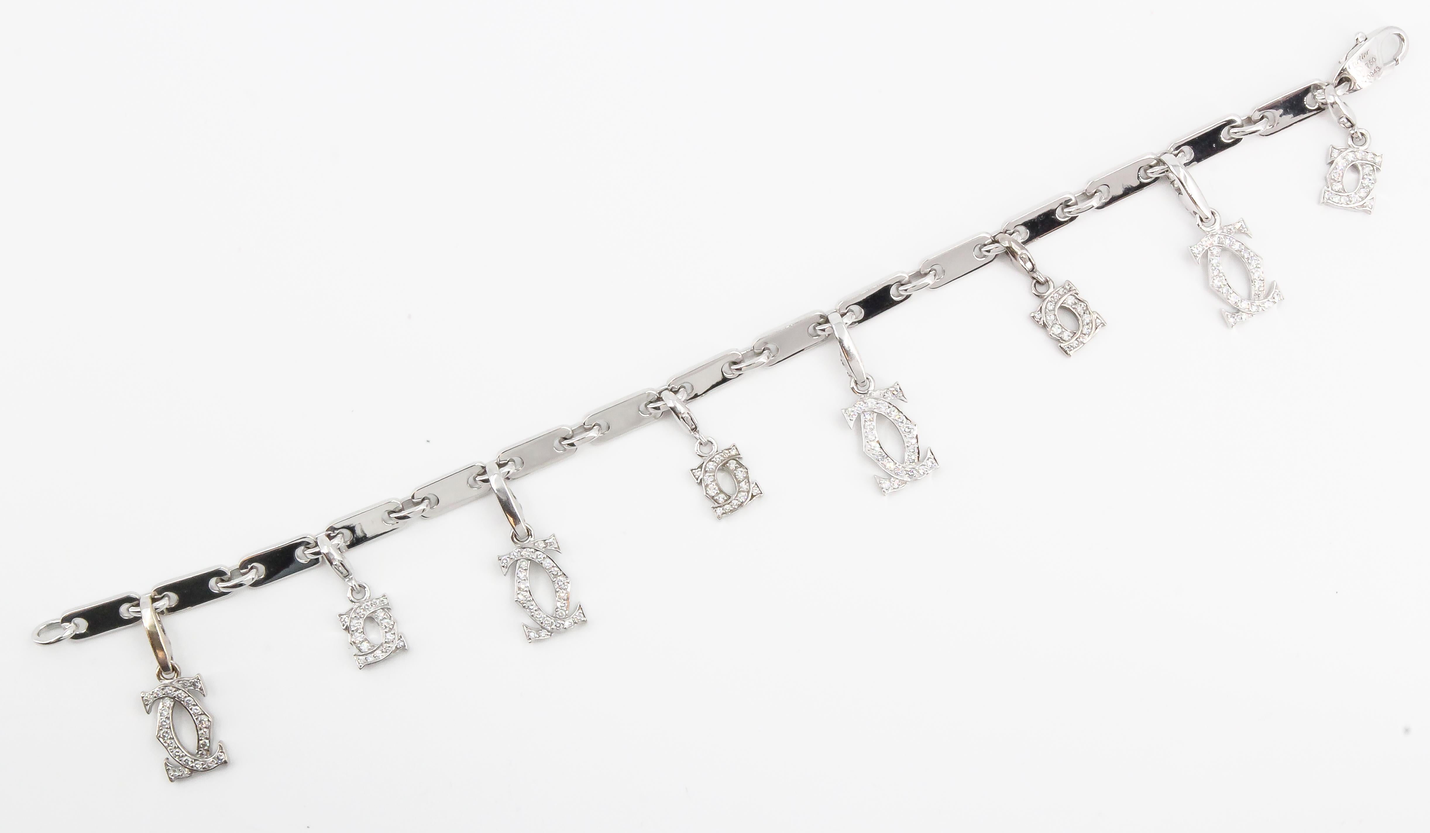 CARTIER Diamond and White Gold Charm Bracelet In Excellent Condition In New York, NY