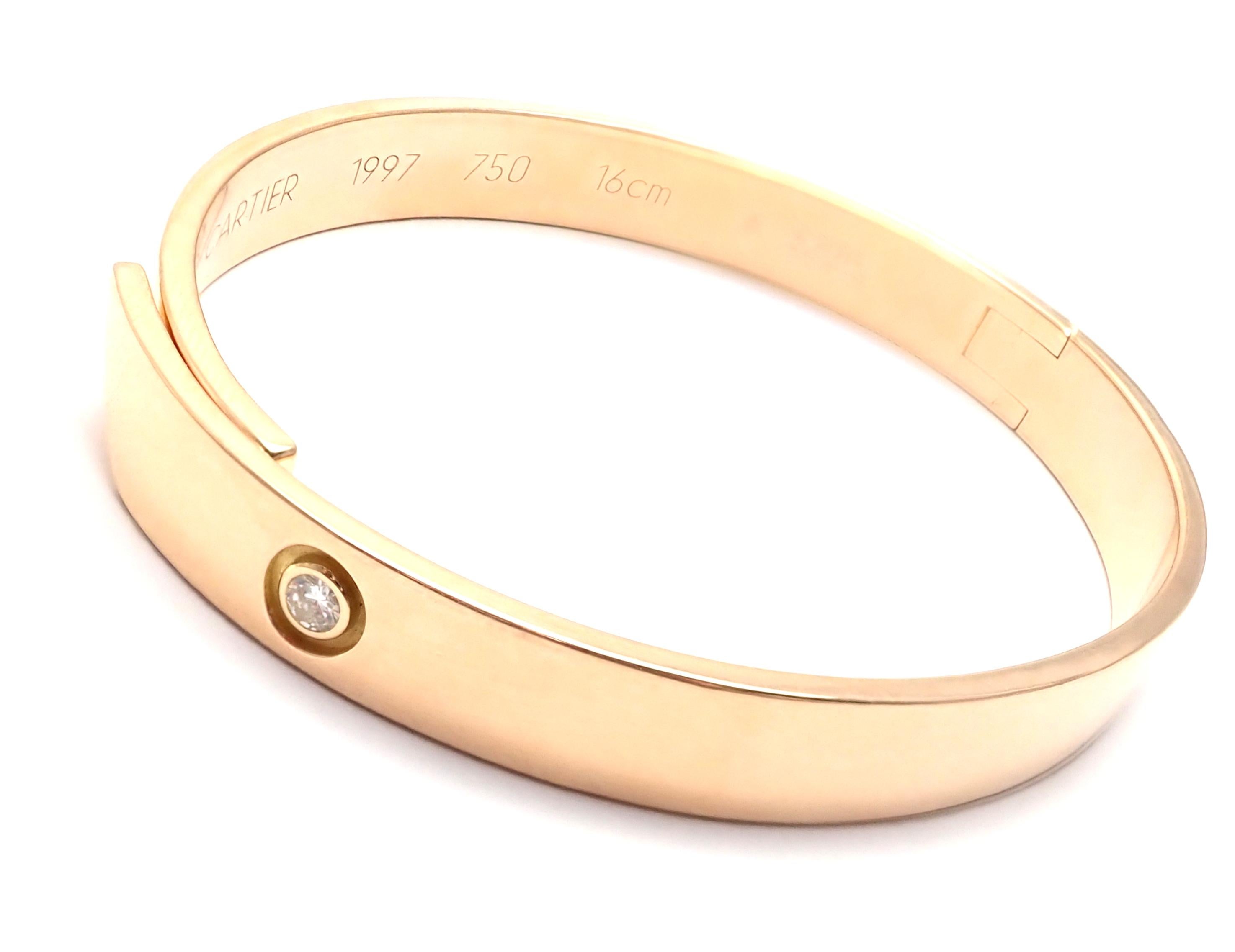 18k Rose Gold Diamond Anniversary Bangle Bracelet By Cartier. 
Size 16. 
With 1 round brilliant cut diamond VS1 clarity, G color total weight .10ct
Details: 
Size: 16
Width: 7mm
Weight: 34.6 grams
Stamped Hallmarks: Cartier 750 16cm 1997 X3225
*Free