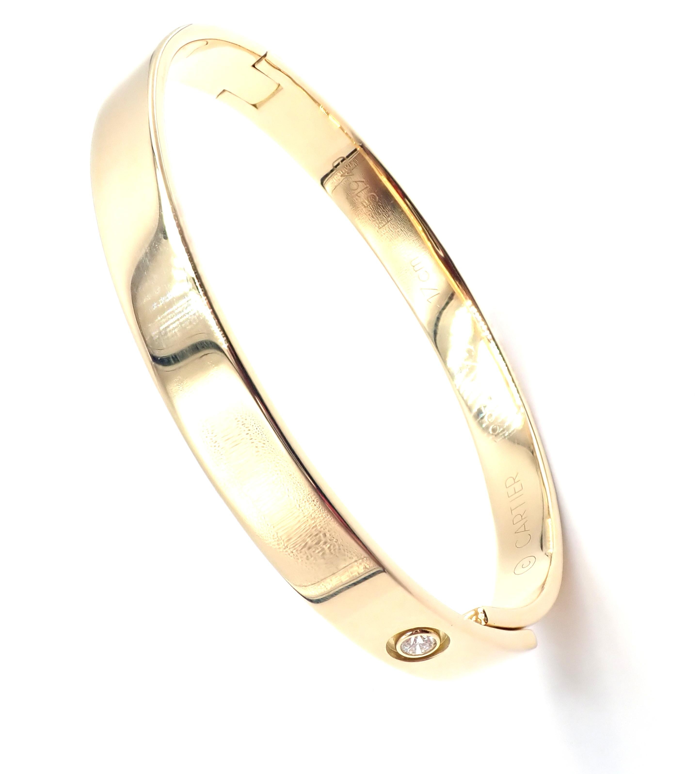 18k Yellow Gold Diamond Anniversary Bangle Bracelet By Cartier. 
 Size 17. 
 This bracelet comes with an original Cartier box. 
 With 1 round brilliant cut diamond VS1 clarity, G color total weight .10ct
This bracelet comes with service paper from