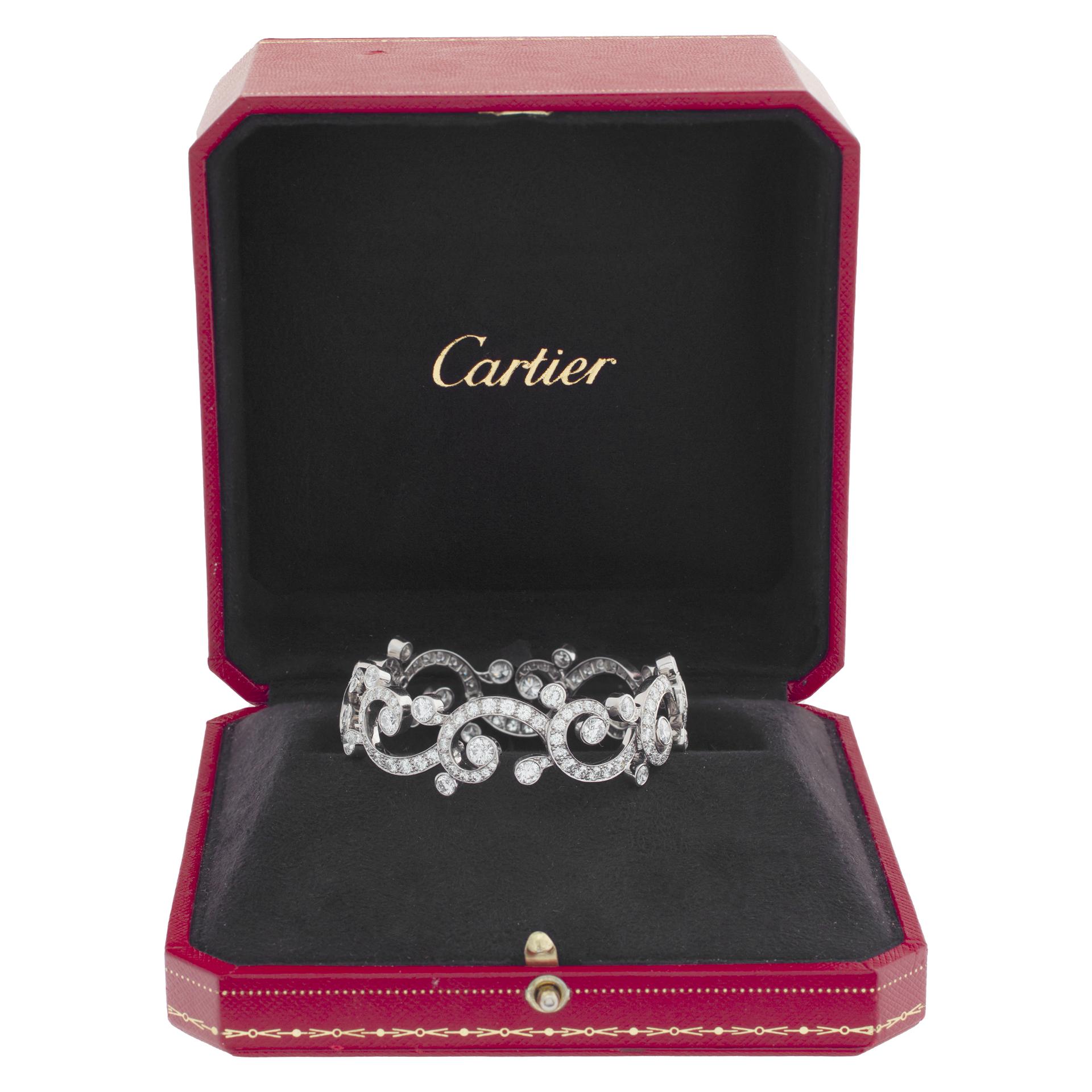 Mesmerizing Cartier diamond bangle bracelet in platinum with over 14 carats in round brilliant cut E-F color, VVS clarity diamonds. 
With Cartier Box. 
Fits wrist 6-7 inches wrist.