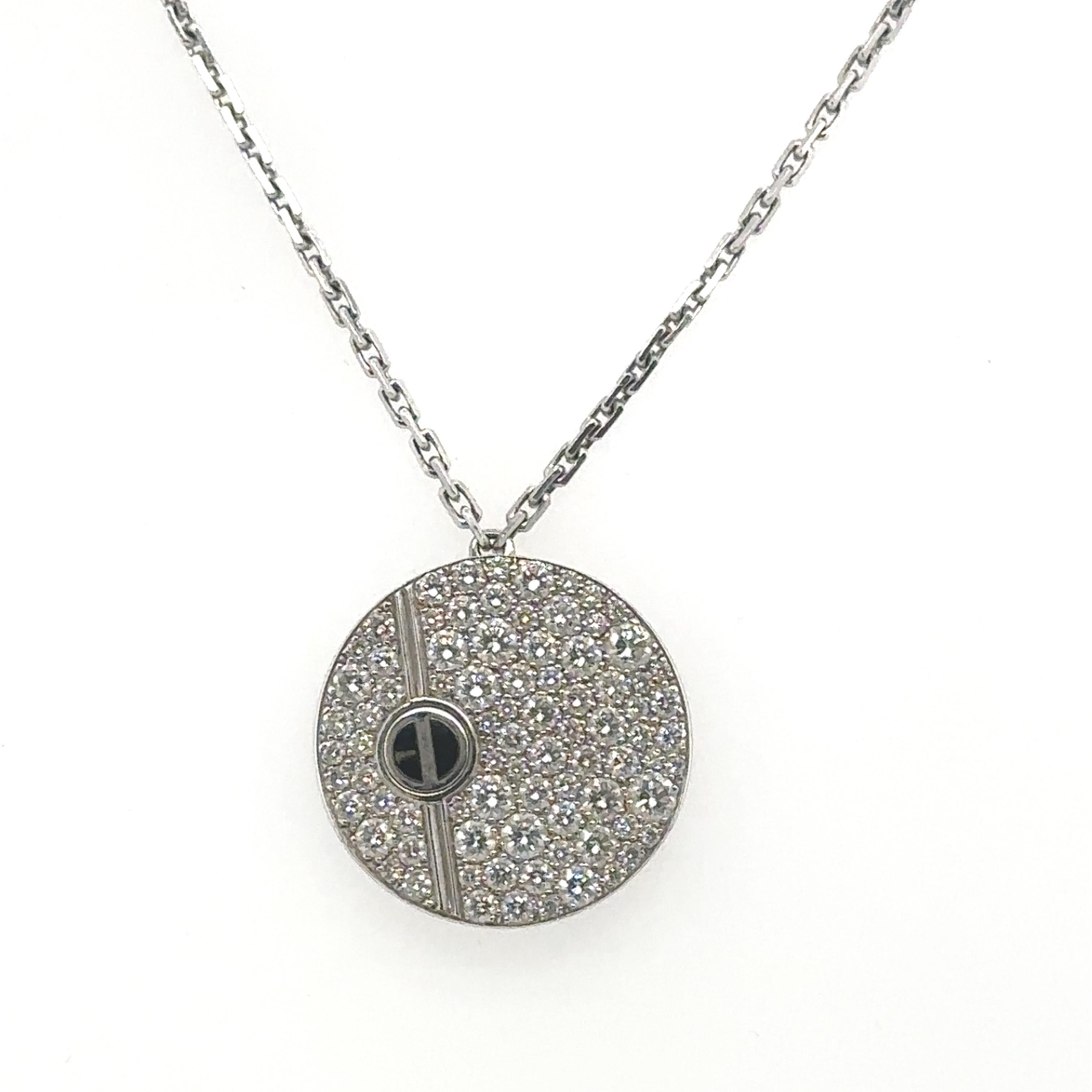 Cartier Diamond & Black Ceramic Love Circle Pendant and Chain.
Crafted of 18K white gold with an 18
