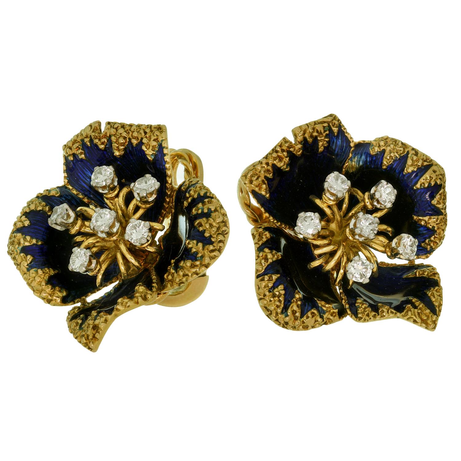 These gorgeous antique Cartier clip-on earrings are crafted in 18k yellow gold and blue enamel and set with round brilliant F-G VVS1-VVS2 diamonds weighing an estimated 0.90 - 1.0 carats. With maker's mark and French assay serial. Made in France