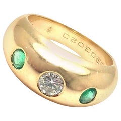 Cartier, bague jonc en or jaune avec diamants et émeraudes au centre