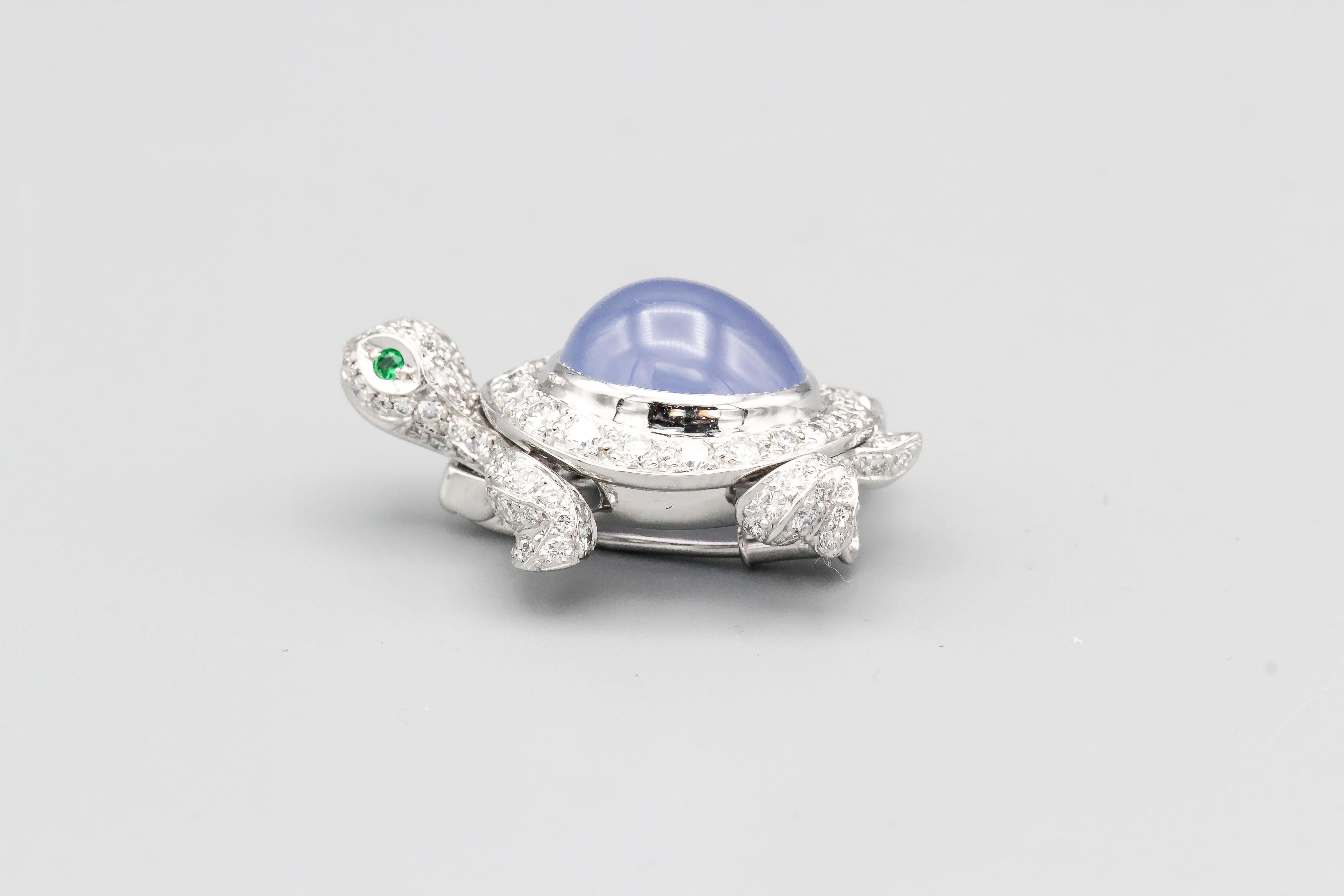Exquisite Whimsy: Cartier Diamond Chalcedony and 18 Karat White Gold Turtle Brooch

This enchanting Cartier brooch embodies a timeless blend of luxury and playful elegance. Its whimsical turtle form is meticulously crafted from gleaming 18-karat