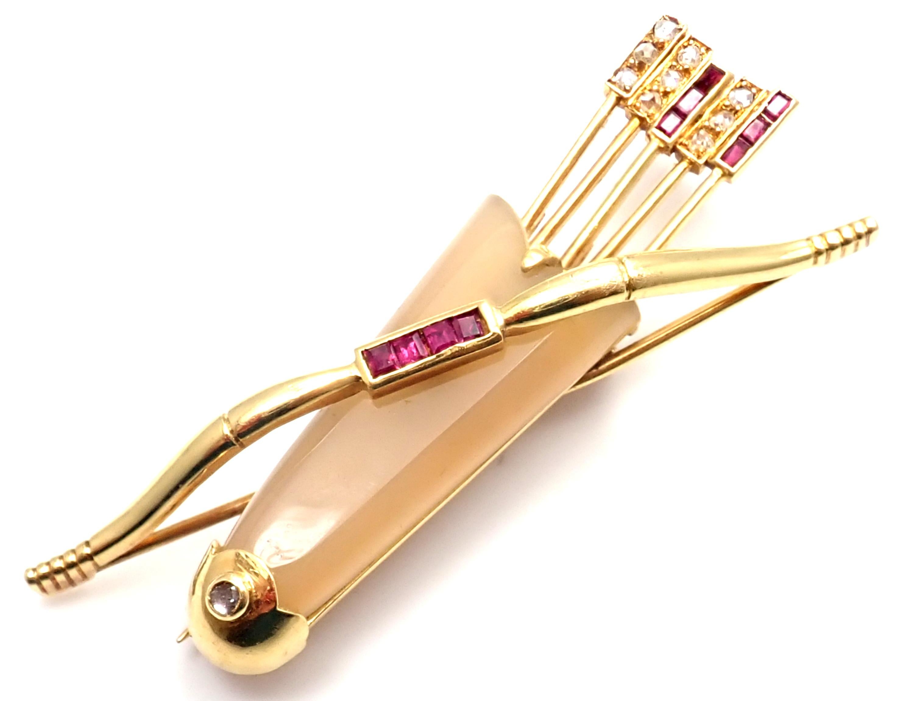 18k Yellow Gold Diamond Ruby Chalcedony Bow And Arrows Pin Brooche by Cartier.
Chalcedony stone 25mm x 12mm
10 rose cut diamonds and 10 rubies
Details:
Measurements: 48mm x 16mm
Weight: 9 grams
Stamped Hallmarks: Cartier France 18k 12426 French
