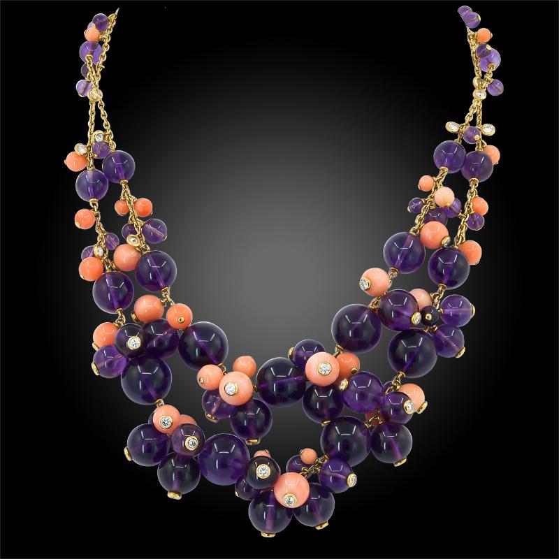 Comprising a ‘Delice de Goa’  suite by Cartier, featuring a ring, necklace and earrings of similar design, each set with finely crafted clusters of polished coral and amethyst beads, some beads accentuated with bezel-set brilliant diamonds at the